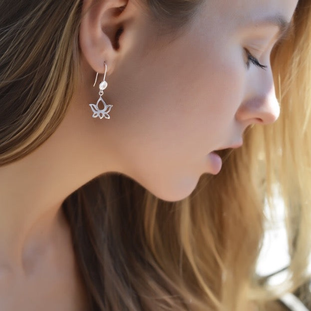 Lotus Dangle Earrings Sky Blue Topaz, White Rhodium over Sterling Silver